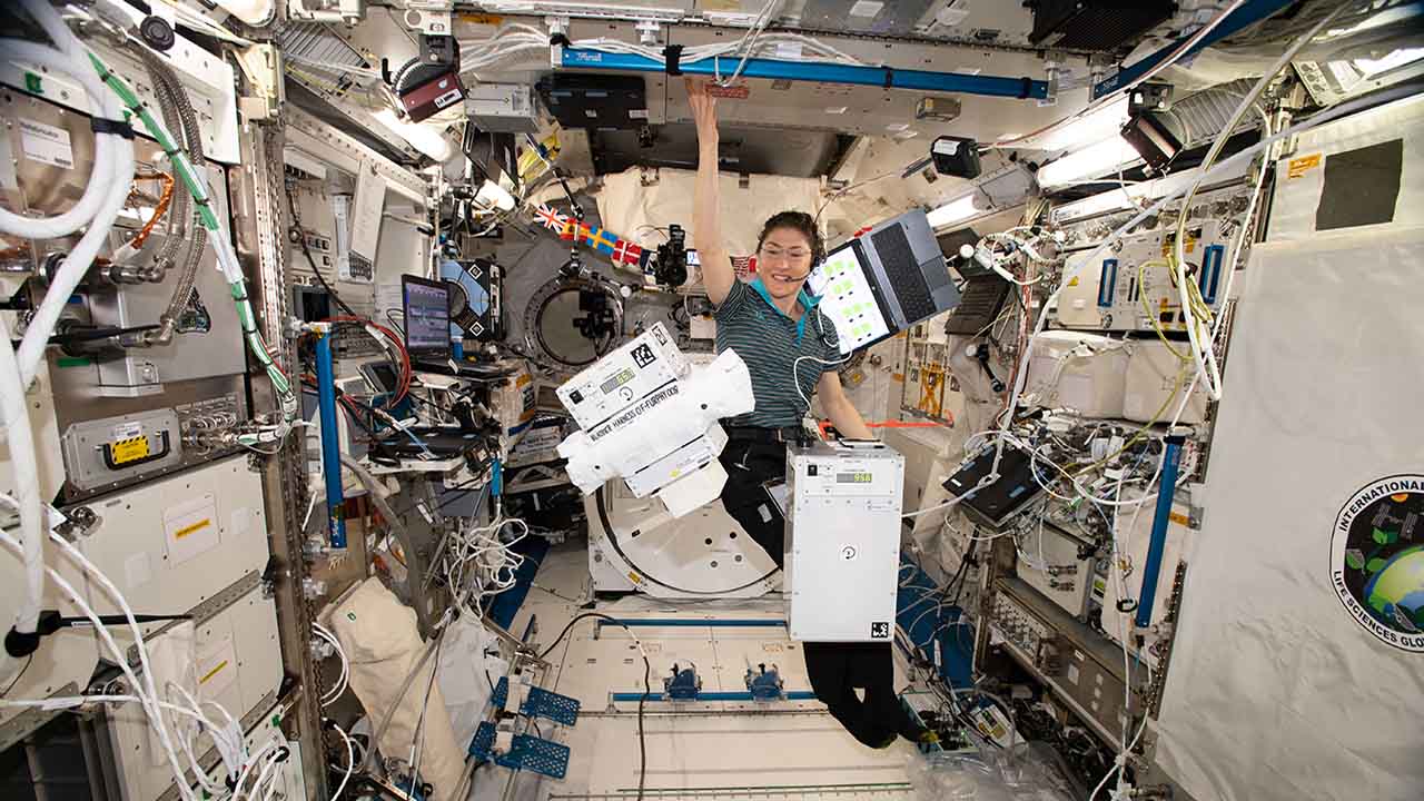 NASA astronaut Christina Koch onboard the ISS with Orbit Fabs FlexTank (left) and the rigid tanker (right) during testing.